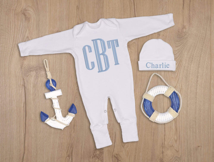 white coming home outfit with monogram for a newborn baby boy