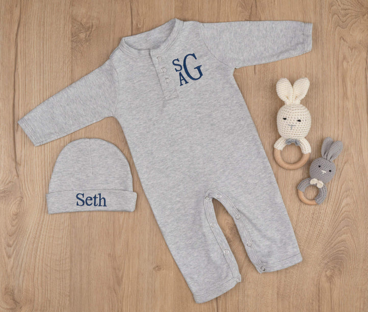 Grey newborn coming home outfit with a stacked monogram and a matching hat